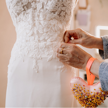 Detailed view of the back of a beautifully altered wedding dress
